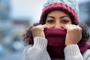 Ways to prevent asthma attacks in the winter include covering your nose and mouth while outdoors.